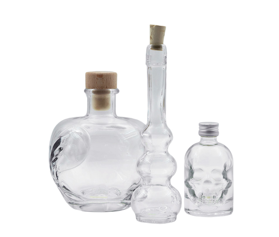 Special shaped Bottles Three special-shaped bottles with different sizes, volumes and lids on a white background