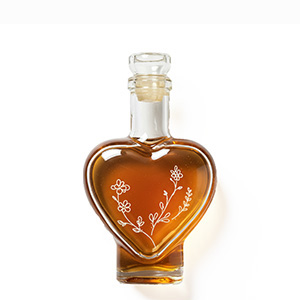 Heart-shaped bottle filled with print