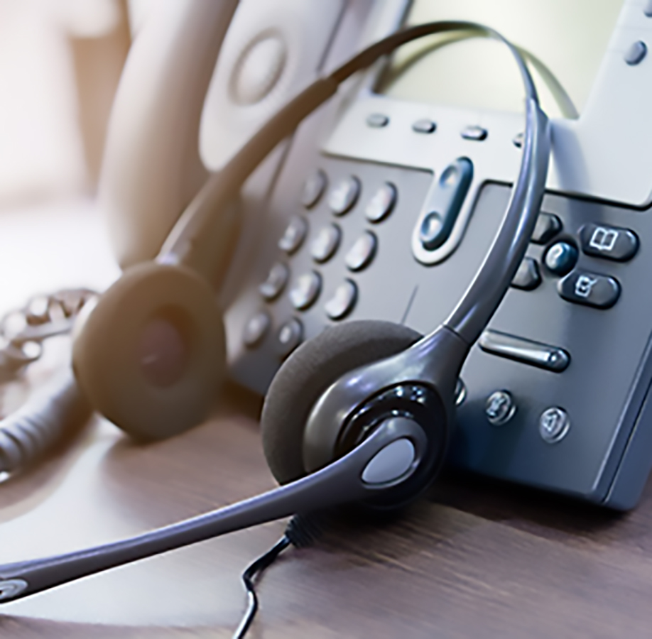 Do you have further questions? Customer service mood: telephone with headset leaning